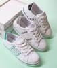 Женские белые кроссовки с зеленой отделкой Celovi - Обувь