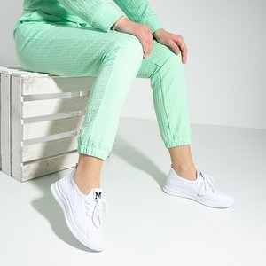 Білі жіночі кросівки Vretiela