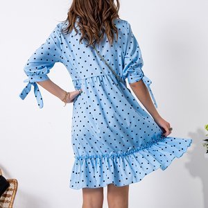 Блакитна жіноча сукня в горошок