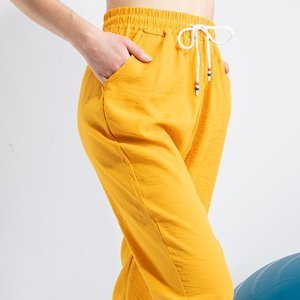 Жовті жіночі спортивні штани PLUS SIZE